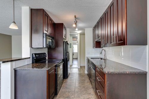 203-4455A Greenview Drive Ne, Calgary, AB, T2E6M1 | Card Image