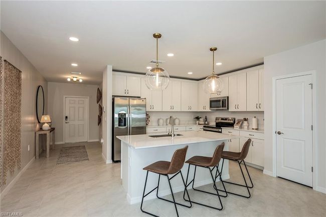 Photo description represents the model home of the same floor plan. | Image 8