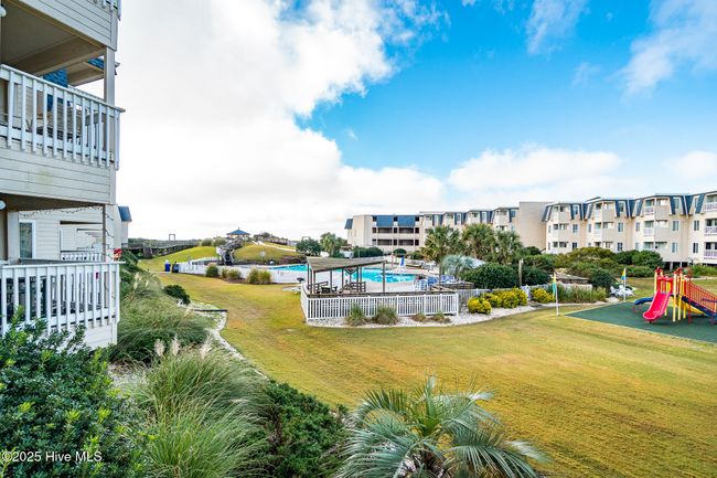 Family friendly common area with pool & playground | Image 31