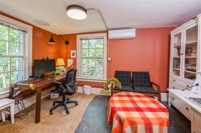 Lower level corner home office with great natural light. | Image 29