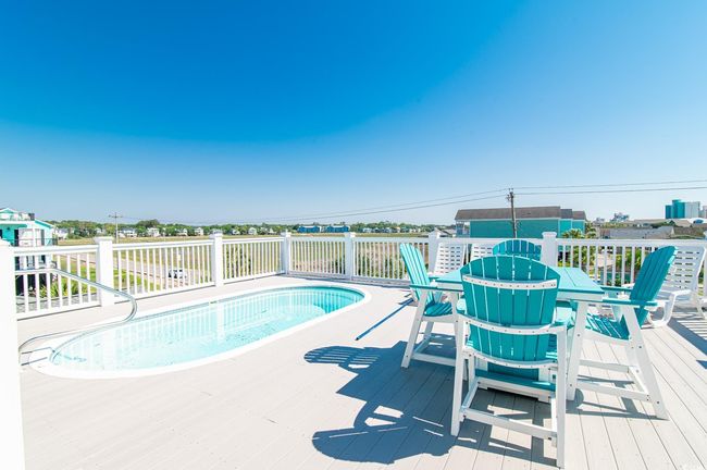 View of swimming pool featuring a deck | Image 7