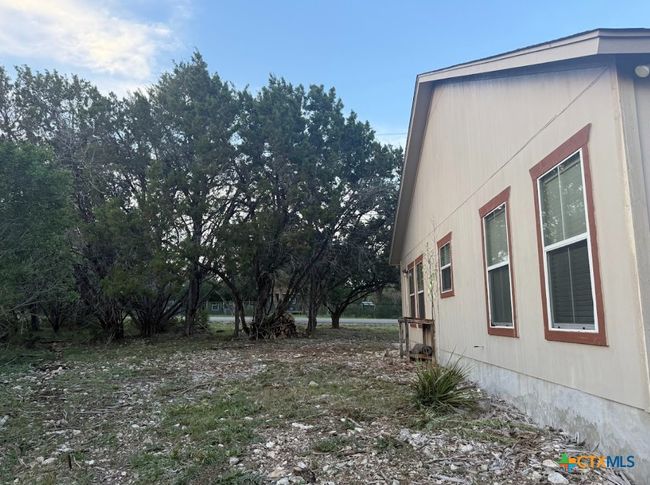 Side view of home. | Image 22