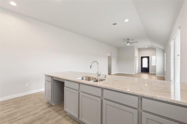 This photo is for illustrative purposes only and is not to be considered an exact replica of the finished home. Rendering does not match the finished product in terms of features, colors, landscaping, etc. Pricing, specifications, square footage and materials are subject to change at any time and without notice. | Image 6