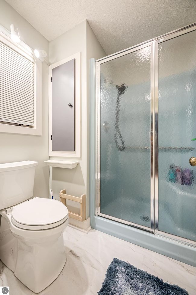 3862 Trillium Dr, House other with 3 bedrooms, 2 bathrooms and null parking in Leland MI | Image 32
