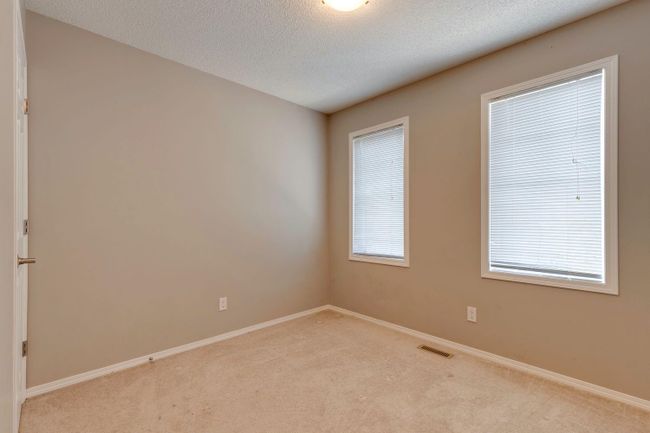 960 Windsong Dr Sw, Home with 3 bedrooms, 2 bathrooms and 4 parking in Airdrie AB | Image 21
