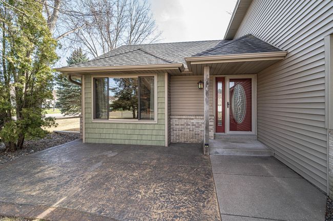 Large stamped concrete patio in front! | Image 36