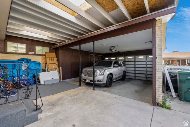 Garage with a garage door opener | Image 15