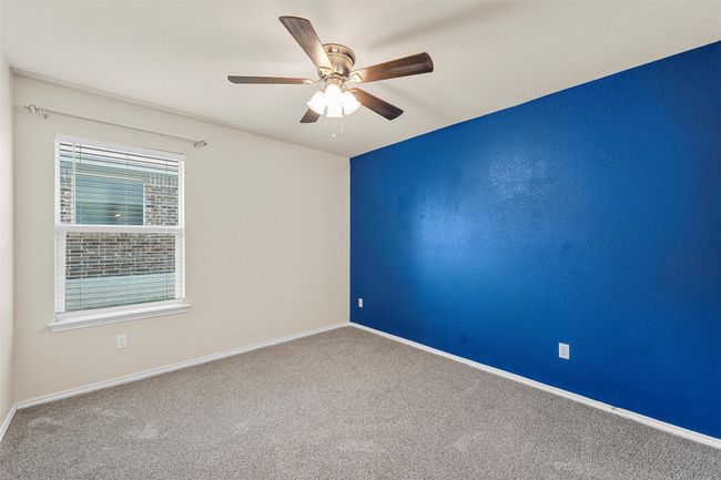 Spare room with carpet flooring and ceiling fan | Image 24