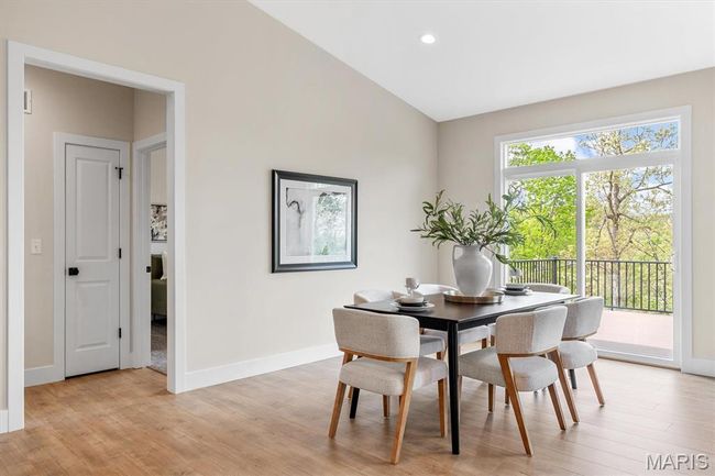 Dining area and hall leading to the secondary bedrooms. | Image 29