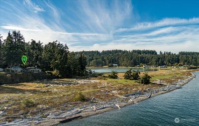 Tucked in the trees just south of Race Lagoon and adjacent to the private beach access path. | Image 1