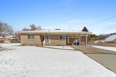 94 S 400 E, Home with 4 bedrooms, 3 bathrooms and 2 parking in Hyde Park UT | Image 1