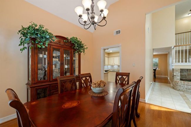 Formal dining room is adjacent to the kitchen, perfect for easy entertaining. | Image 13