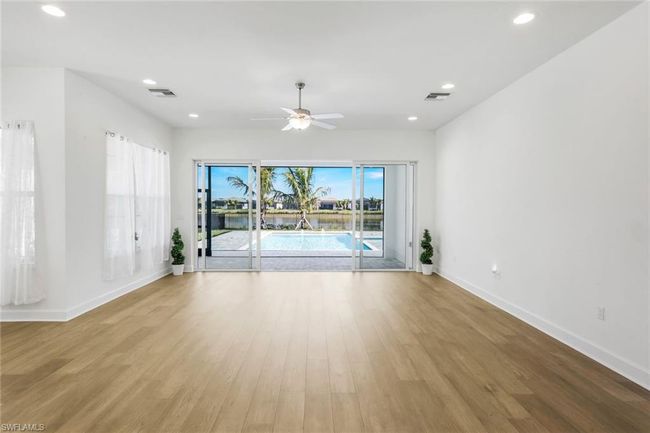 12243 Lotus Ave, House other with 3 bedrooms, 3 bathrooms and 2 parking in NAPLES FL | Image 13