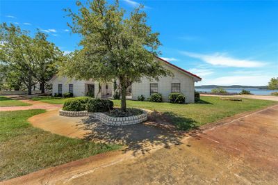 View of front of property featuring a front lawn | Image 1