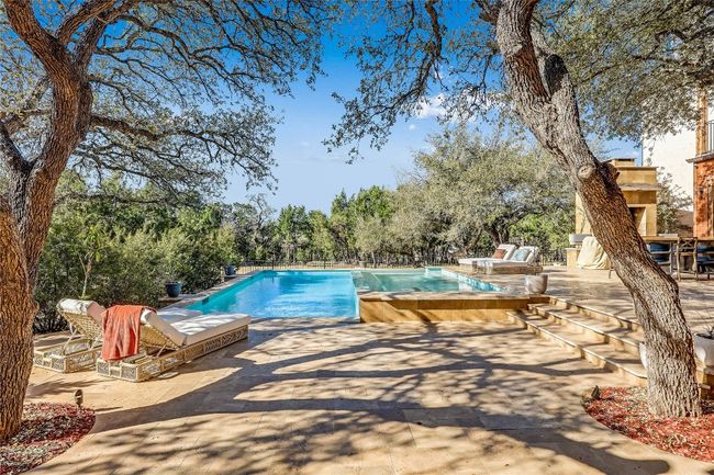 Outdoor pool featuring a patio area | Image 36