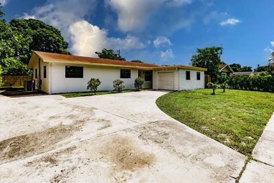 312 Baker Drive, House other with 4 bedrooms, 3 bathrooms and null parking in West Palm Beach FL | Image 2