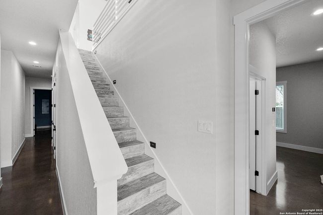 Stairs that lead to the 6 bedrooms (downstairs) | Image 17