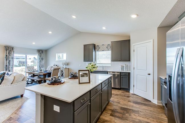 The Finnegan not only boasts an open concept, but vaulted ceilings making the space feel even larger. Photo of Model home. Options and colors may vary. Ask Sales Agent for details. | Image 5