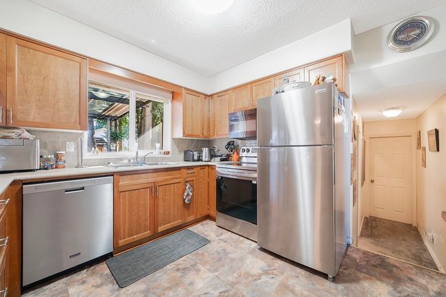 10256 145 Street, House other with 3 bedrooms, 2 bathrooms and 4 parking in Surrey BC | Image 13