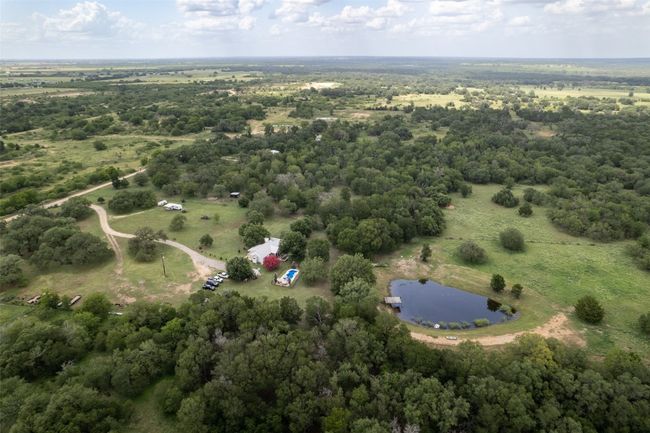 Aerial overview of property's location with a large body of water | Image 24