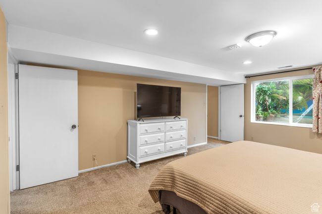 Bedroom featuring recessed lighting, baseboards, and light colored carpet | Image 16