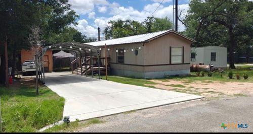 703 Fir Ln, Cottonwood Shores, TX, 78657-9438 | Card Image