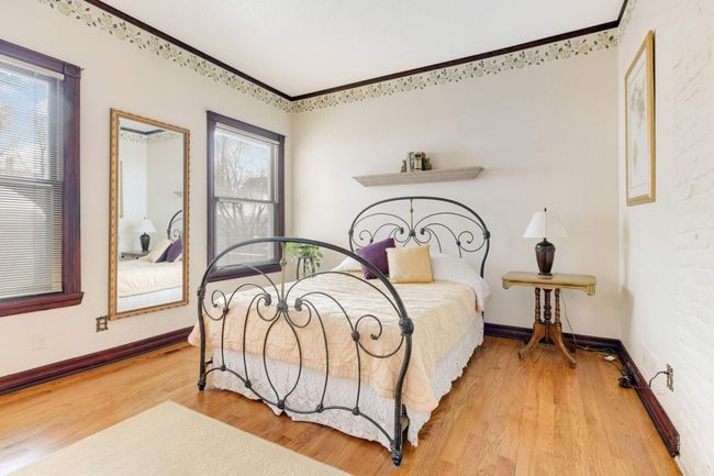 The pimary bedroom has south-facing windows for beautiful light throughout the day. | Image 15