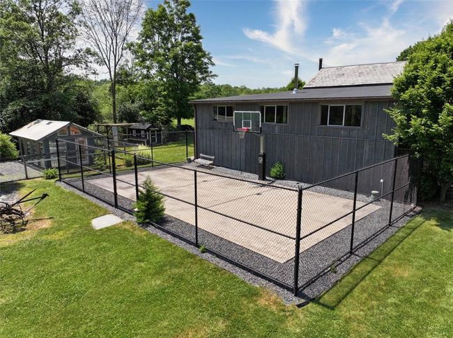 Rear view of barn with basketball court | Image 4
