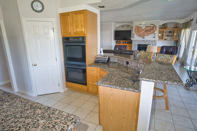 Wrap around Breakfast bar, Double Ovens, and Nice sized Pantry | Image 20