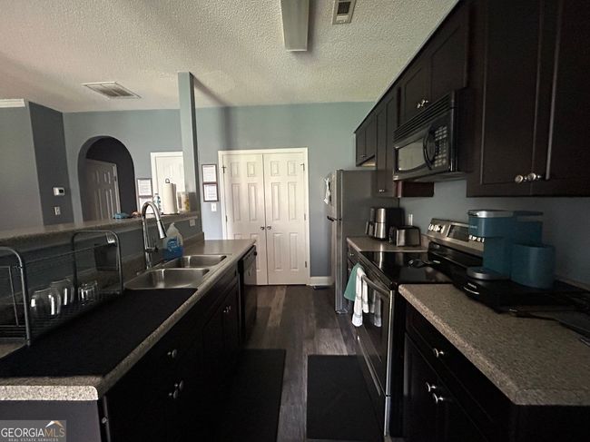 6550 Capitol Knl, Townhouse with 3 bedrooms, 3 bathrooms and null parking in Fairburn GA | Image 5