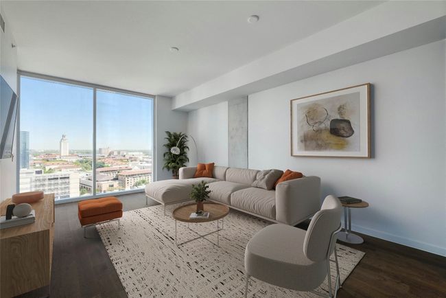 Living room featuring wood finished floors and baseboards | Image 8