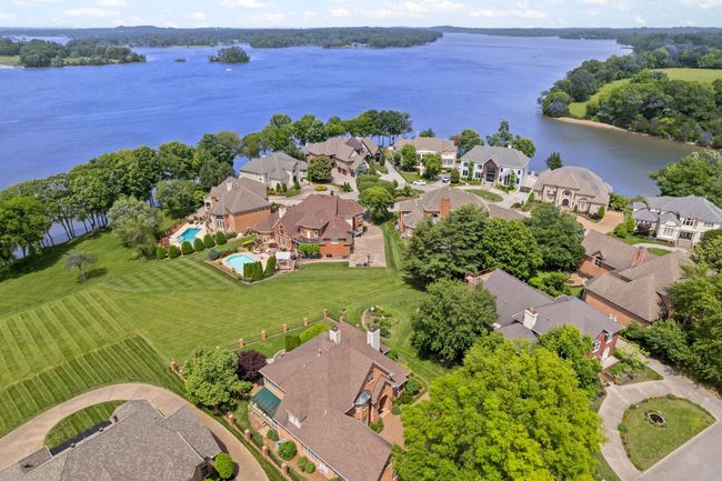 This home features an extra-large bonus room over the garage. | Image 48
