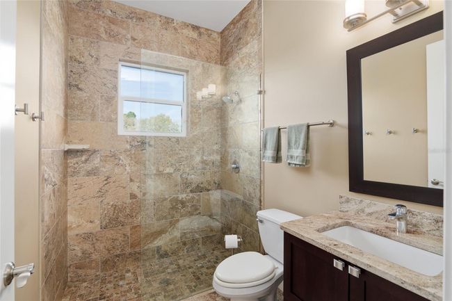 Second guest bathroom with step in shower | Image 57