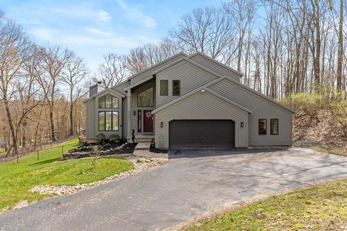 7721 Sun Quest Rdg Ne, Ada, MI, 49301-9558 | Card Image