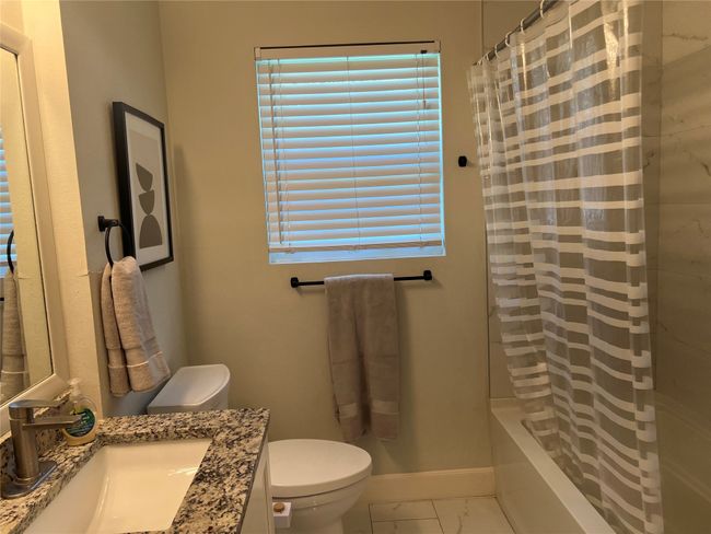 Full guest bath in main house with granite counter tops | Image 21