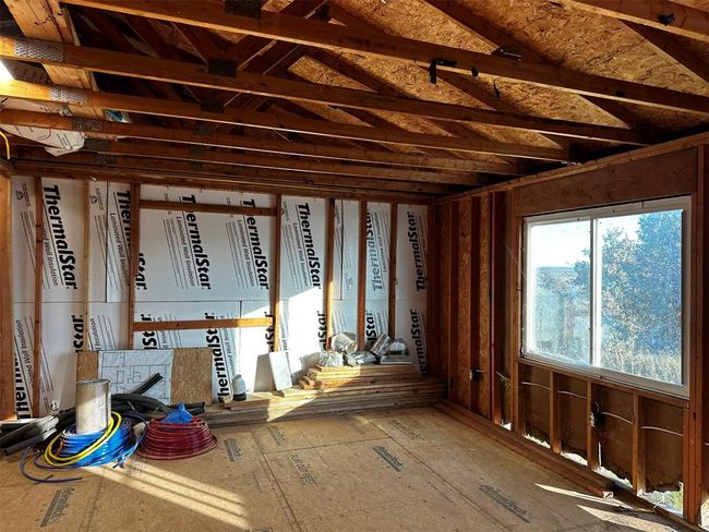 in kitchen looking into living room with framed French door opening and plumbed for propane gas fireplace. | Image 18