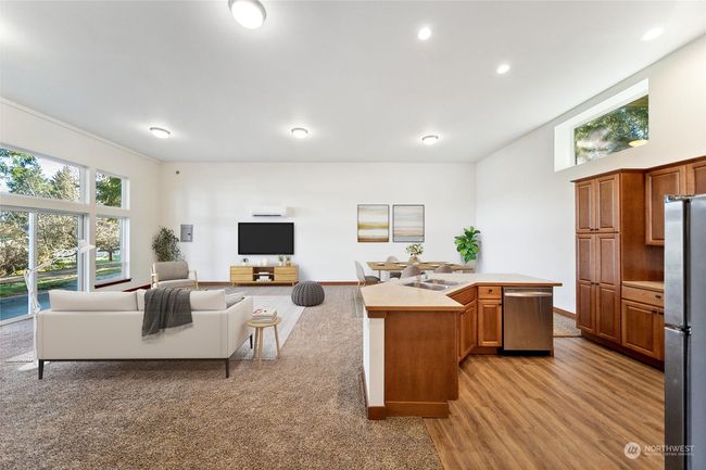 Vaulted ceilings bring in all of the light. Virtually staged. | Image 22