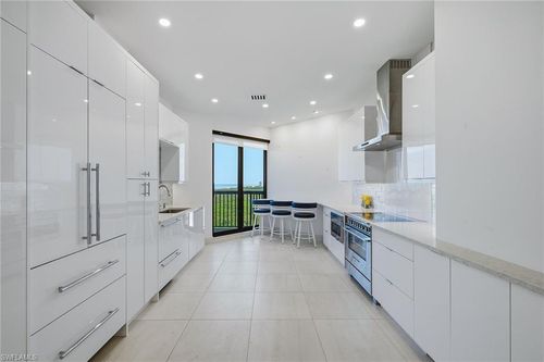 c-6075 Pelican Bay Blvd, NAPLES, FL, 34108 | Card Image