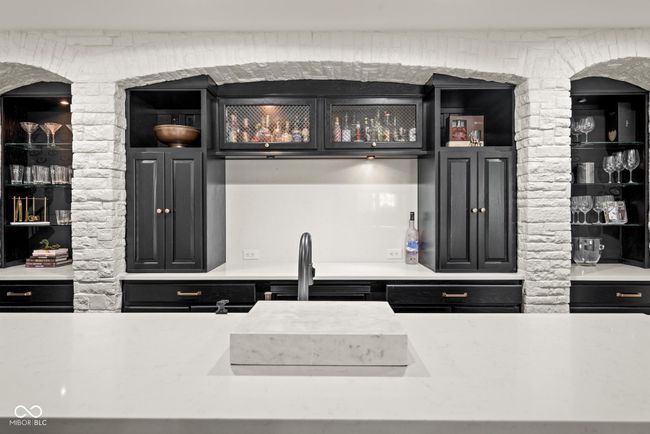 bar area with a sink | Image 75