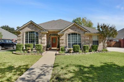 View of front of house featuring a front lawn | Image 1