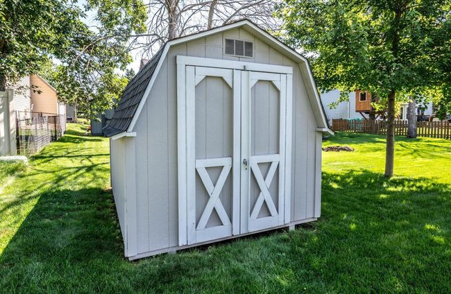 Storage shed (10x 8) with architectural shingles matching roof on home. | Image 36