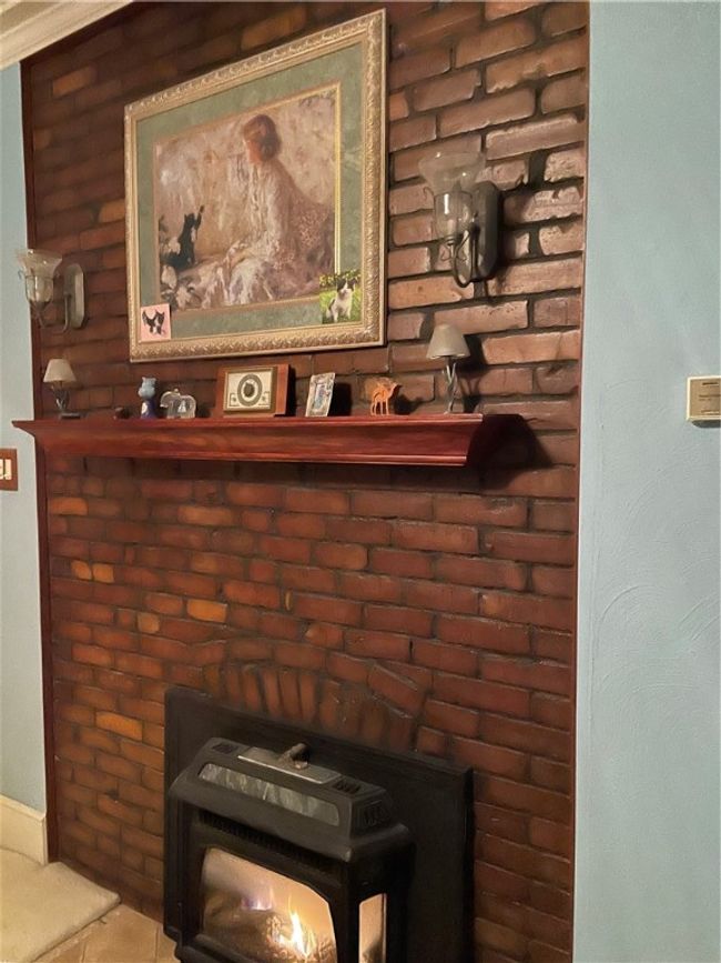 Gas fireplace in primary bedroom | Image 10