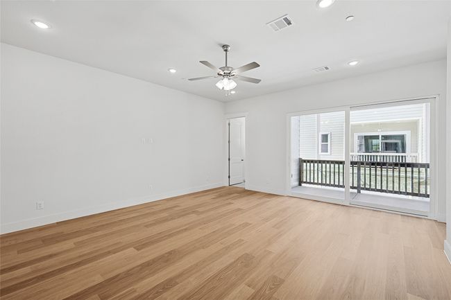 Unfurnished room featuring light hardwood / wood-style floors and ceiling fan | Image 10