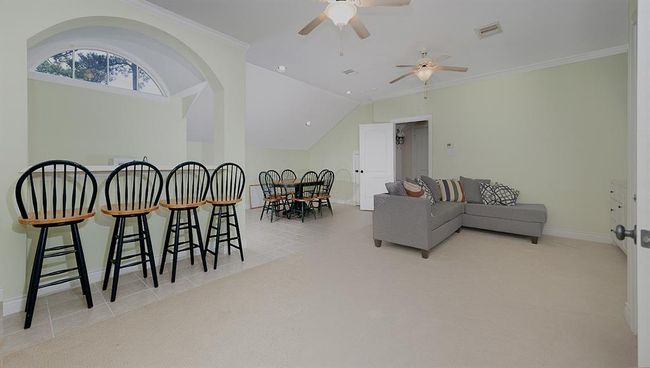3rd floor living area with kitchenette has an additional two bedrooms and media room | Image 41