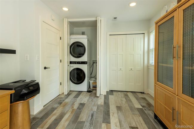Laundry closet with stacking units | Image 24