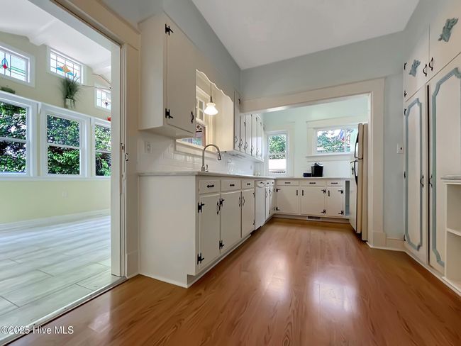 View of kitchen and adjoining sunroom | Image 12