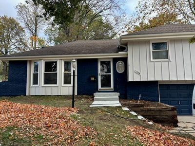 Split level home with a garage | Image 1