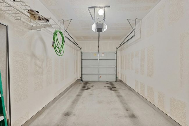 One car garage is attached and has automatic opener | Image 23