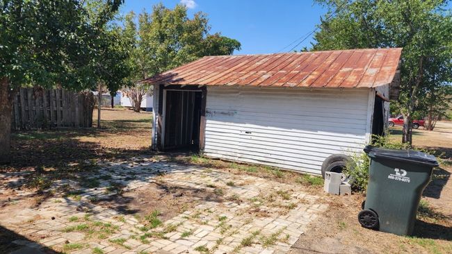 Garage with fence | Image 13