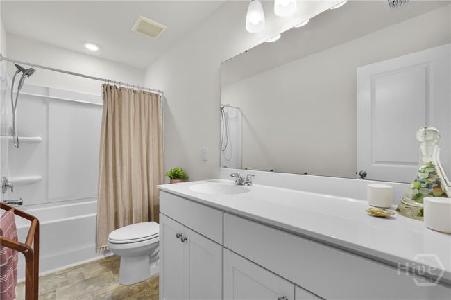 Guest bathroom between the two guest bedrooms, very spacious. | Image 32